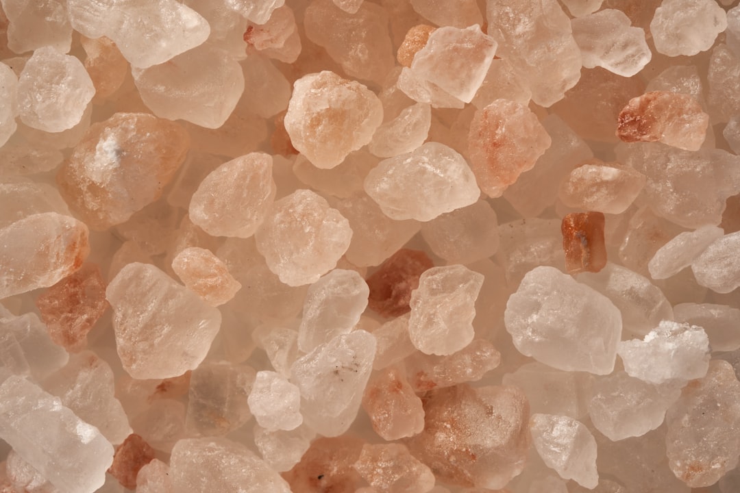A professional laboratory setting where organic grains and Himalayan salt are being tested for purity and quality assurance